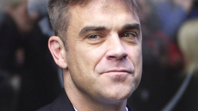 Porod Teddy byl jako scéna z Predátora, šokoval Robbie Williams