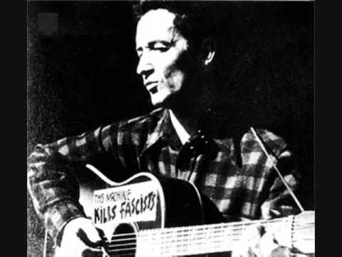 Profilový obrázek - Woody Guthrie- This Land Is Your Land
